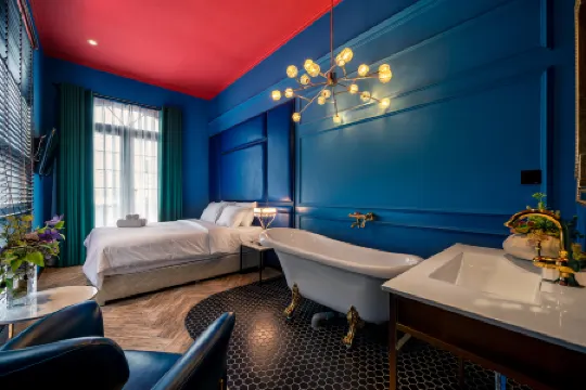 Hotel le Jardin Secret Saigon Отели рядом с достопримечательностью «Здание городского совета»