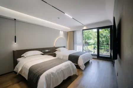 Qi·Yue Homestay Отели рядом с достопримечательностью «Zhutan Mountain»