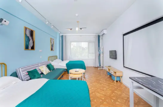 Yisheng Homestay (Qingdao Railway Station Zhanqiao) Hotels near 劈柴院