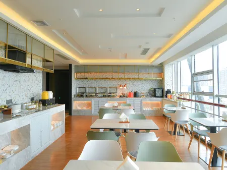 Magnotel Hotel (Linyi Luozhuang Shuangyueyuan Road) Отели рядом с достопримечательностью «Luozhuang Zoo»