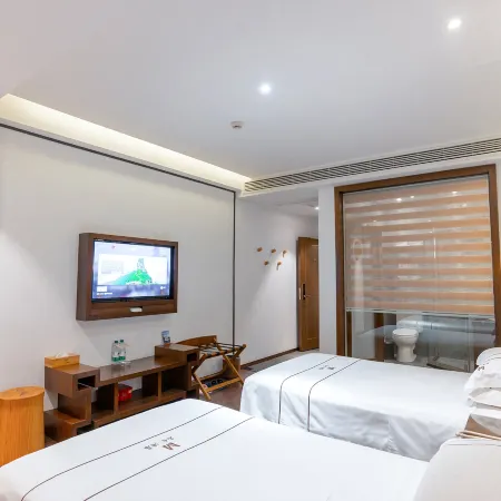 Shiqian Mingshe Art and Culture Hotel (Tangshan Bus Station, Wenquan Avenue)