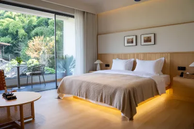 Boji Cai Hot Spring Homestay (Ya'an Zhougong Mountain Hot Spring) Отели в г. Горячие источники горы Zhougong