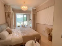 Fengzhiyu Homestay (Weihai Park Wanda Plaza) فنادق في ويخاي