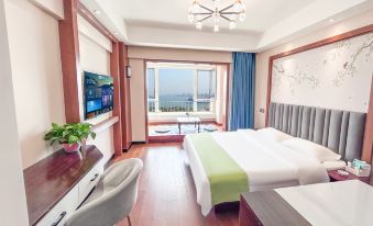 Muhai Lvsu Seaview Apartment (Development Zone Shibeiwan Water Park Branch)