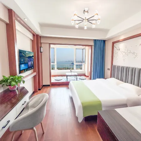 Muhai Lvsu Seaview Apartment (Development Zone Shibeiwan Water Park Branch)