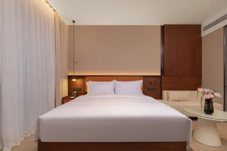 Baiyue Hotel Отели рядом с Аэропорт Энши