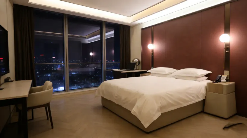 He chuan Lijing Zhenpin Hotel ( He Chuan Bao Long Square Keyun Station ...