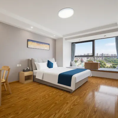 Aiyi Future Serviced Apartment (Shenyang Qingnian Street Maoye Center Branch) Hotels near Kubeiland