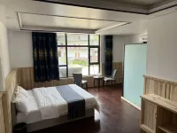 Qingfan Mountain House Homestay Inn - balcón