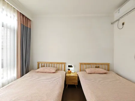 Peace Time Shiqu Homestay Отели рядом с достопримечательностью «Gymnasium (Hubin Road)»