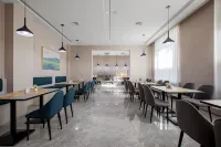 Yiju Hotel (Huma County Riverside Park) - พร้อมอาหารเช้า