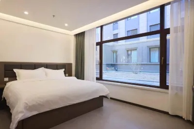 Qiqihar Shatangju Business Hotel Hotels in Qiqihar South Station
