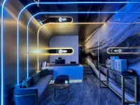 HiGo E-sports Hotel (Xinyang Railway Station Tianrun Plaza) - Esports