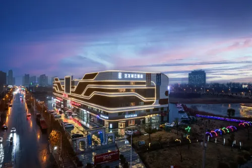 Elong R.YUN Hotel (Huoqiu Jiuyue Liuhe Street Wanda Plaza) - parking