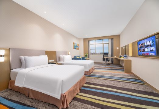 시티 홀리데이 호텔 외관 및 객실