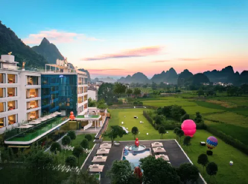 Free Bird Resort Hotel Hotel dekat Yulonghe Scenic Area