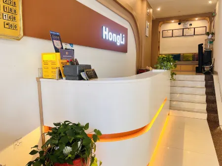 Hongli Hotel (Shanghai Songhong Road Subway Station) Отели рядом с достопримечательностью «Xinjing Park»