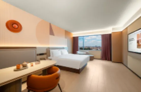 Orange Hotel (Foshan Pingzhou Yingyue Lake Huanyu City) Hotels near Nanhai No.1 Middle School Stadium
