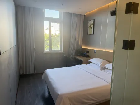 Shanghai Huixin Hotel (Pujiang Wanda) Отели рядом с достопримечательностью «Auxiliary Wharf of Shuitou International Rock City»