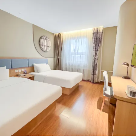 Home Park Yun Hotel (Jixi Jinlong Building Train Wanda Plaza Branch)
