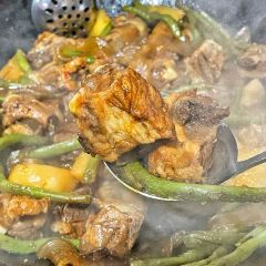 Stewed river fish in an iron pan User Photo