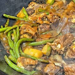 Stewed river fish in an iron pan User Photo