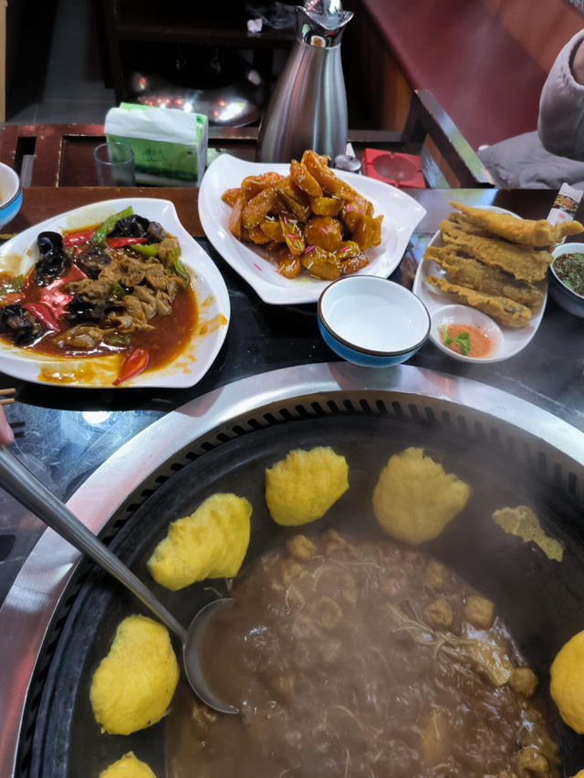 Trying out Beijing Tie Guo Dun Dish