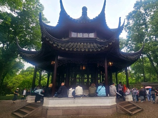 I came to this garden in Suzhou, and I was stunned by its beauty
