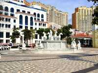 Pose Like a Roman at the Fountain of Sunset Town