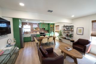 Green Kitchens and Floral Bedrooms Inside Uptown Peach Suite 2213A
