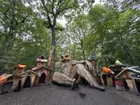 Art sculptures lost in a forest