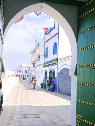 🚪 The Doors of Asilah — Every Door Has a Story

📍 Asilah Medina, Morocco 🇲🇦

Walk through the narrow lanes of Asilah and you'll quickly notice something special: the doors are part of the city's identity.

Painted in shades of blue, framed by brilliant white walls, decorated with traditional details, or standing quietly beneath old arches, each doorway gives the Medina its own personality. 🎨✨

What makes photographing Asilah so rewarding is the variety. One corner reveals a beautifully painted entrance; another offers an aged wooden door surrounded by whitewashed walls; a few steps later, a completely different design appears.

🚪 From traditional wooden doors to colorful Mediterranean entrances, Asilah turns something ordinary into beautiful street art.

📸 What to look for
· Blue doors against white walls
· Intricate traditional details
· Old wooden entrances
· Doors beneath arches
· Colorful doors surrounded by flowers or plants
· Small doors hidden inside narrow alleys
· Interesting combinations of doors, windows and walls

💡 Traveler Tip
Don't just photograph the door itself. Step back and capture the surrounding architecture—the alley, walls, windows and shadows can make the composition much more powerful.

📍 Best experience: Explore the Medina on foot and look around every corner. Some of the most photogenic doors aren't on the main paths.

#Asilah  #AsilahMedina  #DoorsOfAsilah  #Morocco  #MoroccoTravel  #VisitMorocco  #MoroccanArchitecture  #Medina  #MoroccoPhotography  #TravelPhotography  #HiddenMorocco 