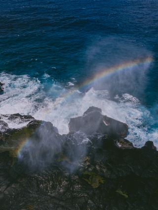 오전 9시 45분에 사모아에서 하늘에 무지개 모양을 찍었습니다