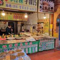 A Historical Lane With Many Street Food