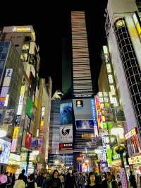 Godzilla and the bustling street of Shinjuku