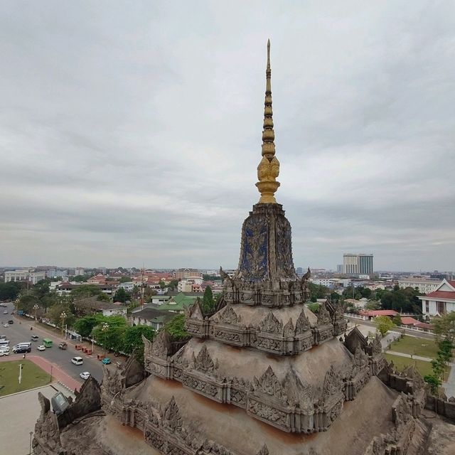 Ascending to Elegance: Patuxay's Embrace Above Vientiane