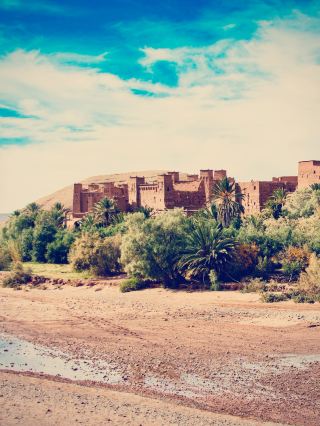 The Well-Keeper's Clearing: A Desert Island Sunset at Darya Boyi
