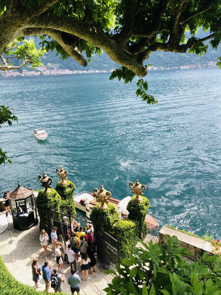 Set off to explore the enchanting lakeside towns of Tremezzina and Bellagio in the Province of Como—where sun glimmers on the water, and each moment feels straight out of a postcard.

🗺️Travel routes:
Start your journey in Tremezzina, home to the iconic Villa del Balbianello (22016 Tremezzina, Province of Como). This villa is open Jan–Oct from 10:00 to 18:00 (closed Mon, Wed), with adjusted winter hours—plan accordingly to avoid closed days. After soaking up the villa's history and panoramic lake views, take a ferry to Bellagio for a scenic transition.

In Bellagio, wander through I Giardini di Villa Melzi (Via Lungo Lario Manzoni, 22021 Bellagio) which opens daily 10:00–18:30. Dive into the tranquil gardens and lakefront serenity. Stroll to Cappella di Villa Melzi and the elegant Scalinata per accedere a Villa Giulia nearby (Via Melzi d'Eril, 12), open all day.

🏞️Must-visit attractions:
· Villa del Balbianello: Lush gardens, architecture, and film history, set on a wooded promontory.
· I Giardini di Villa Melzi: Botanical gardens, statues, and peaceful lakeside paths.
· Cappella di Villa Melzi: Neoclassical chapel nestled in the gardens.
· Scalinata per accedere a Villa Giulia: Photogenic staircase that opens to the elegance of Villa Giulia’s waterfront.

🏨Hotel recommendations:
Consider lakeside stays like Grand Hotel Tremezzo (for lavish amenities and unbeatable views) or Hotel Belvedere Bellagio (for garden terraces and spa experiences).

❤️Reasons for recommendation:
Both offer direct lake access, panoramic views, classic Italian charm, convenient proximity to major sights, and superb on-site dining.

🧳Pre-trip preparation:
Pack comfortable shoes for exploring gardens and cobblestone paths. Bring sunscreen, a sun hat, light layers, and a camera to capture the natural beauty. Check ferry schedules between towns in advance.

🚉How to get around:
Utilize ferries for quick lake crossings; Bellagio and Tremezzina are well-connected by boat. For land travel, local buses and taxis are readily available. Walking remains the best way to savor lakeside scenery.

🍽️Food recommendations:
Indulge in local specialties: try risotto al pesce persico (perch risotto), missoltini (lake shad), and polenta uncia. In Bellagio, look for garden-side trattorias serving fresh pasta and lake fish.

💡Recommended things to do:
· Book a guided tour of Villa del Balbianello for special insight.
· Picnic in the shade of camellias at Villa Melzi’s gardens.
· Climb the Scalinata for sunset photos.
· Sample gelato at lakefront cafés.

📌Notes:
Purchase attraction tickets ahead of time (especially for Villa del Balbianello). Most places accept card payment, but always carry a little cash. Opening hours may vary by season—double-check before arrival.

#LakeComo #VillageEscape #GardenWalks #ItalianCuisine #TravelTips