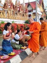ตักบาตรข้าวเหนียววัดหลวงปากเซ ไหว้ศาลหลักเมือง