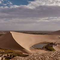 🏜️ Mingsha Mountain & Crescent Spring: Dunhuang’s Desert Mirage – A Complete Guide