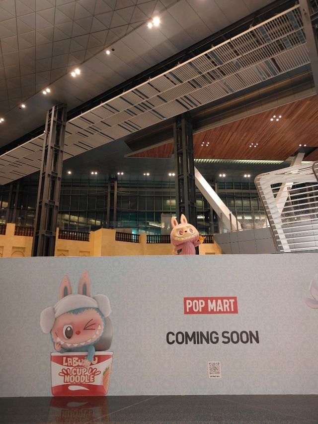 Between Benz and Bear: A Surreal Stroll Through Hamad Airport