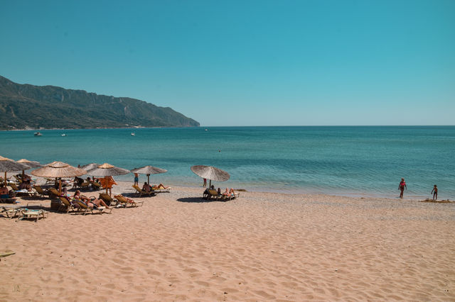 Corfu's Calm Golden Sand Coast: Agios Georgios Beach