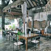 THIS COFFEE SHOP OWNED BY MARIO LAWALATA FEATURES AN "UNFINISHED" CONCEPT FOR ITS DESIGN