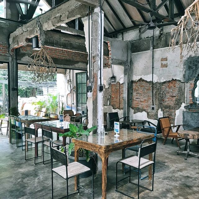 THIS COFFEE SHOP OWNED BY MARIO LAWALATA FEATURES AN "UNFINISHED" CONCEPT FOR ITS DESIGN