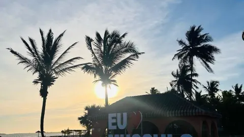 "Golden Hour Magic by the Sea: Beachside Sunsets and Culinary Delights! 🌅🐙✨" — traveler post in Luanda Province