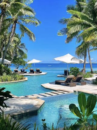 Tropical Bliss Awaits in Fiji 🌴🌊✨ If you dream of white-sand beaches, vibrant coral reefs, and endless island sunshine, Fiji is your Pacific paradise! Get ready for epic snorkeling, immersive Fijian culture, and sunsets you’ll never forget.

Start your adventure at Denarau Island—Fiji’s resort central. 🏝️ Spend your morning kayaking or paddleboarding along tranquil lagoons, then stroll Denarau Marina for souvenirs and a taste of local cuisine. Snap a classic group shot with yachts bobbing in the turquoise harbor—totally insta-worthy!

Hop on a boat to the Mamanuca or Yasawa Islands for a real slice of heaven. Must-do: snorkeling or diving at the famous Coral Reefs—think rainbow fish and crystal-clear water. If you’re after “that” sunset shot, climb a beachside lookout around golden hour or catch the sky from a catamaran cruise.

Practical visiting tips: Fiji’s dry season (May–October) means sunny, comfortable weather and calmer seas—perfect for water sports! Many island resorts are only accessible by boat; check ferry or water taxi schedules ahead, and don’t pack too heavy—a light duffel bag is king out here. 

Key precautions: Reef-safe sunscreen is a must to protect marine life (and your skin!). Tap water on remote islands isn’t always potable—always ask at your accommodation or stick to bottled water.

Ready for slow island mornings and breezy afternoons by the sea? Bula—it’s Fiji time!  
#Fiji  #IslandParadise  #Snorkeling  #BeachVibes  #TravelTips 