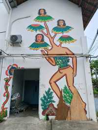 Citra Sasmita's enigmatic wall art at the Bali Kuta bus station.
