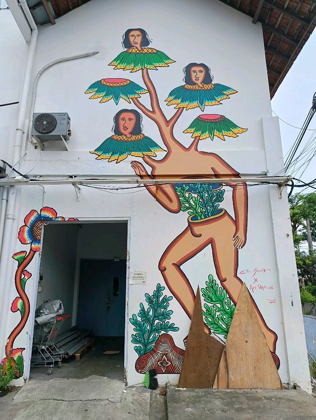 Citra Sasmita's enigmatic wall art at the Bali Kuta bus station.