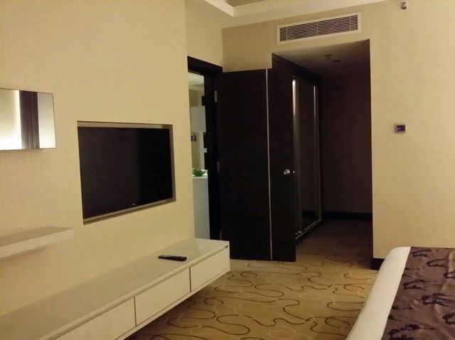 "The Promenade Hotel-Where City Convenience Meets Cozy Comfort"