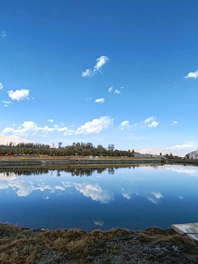 Reflections of Snow Mountains on the Golden Grassland: A Mirror Painting of the Pamir